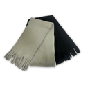 Fleece scarves with fringes on the end, one black and one gray, folded