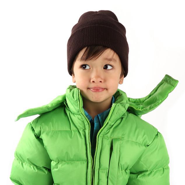 Child Male wearing green coat and black beanie, front view
